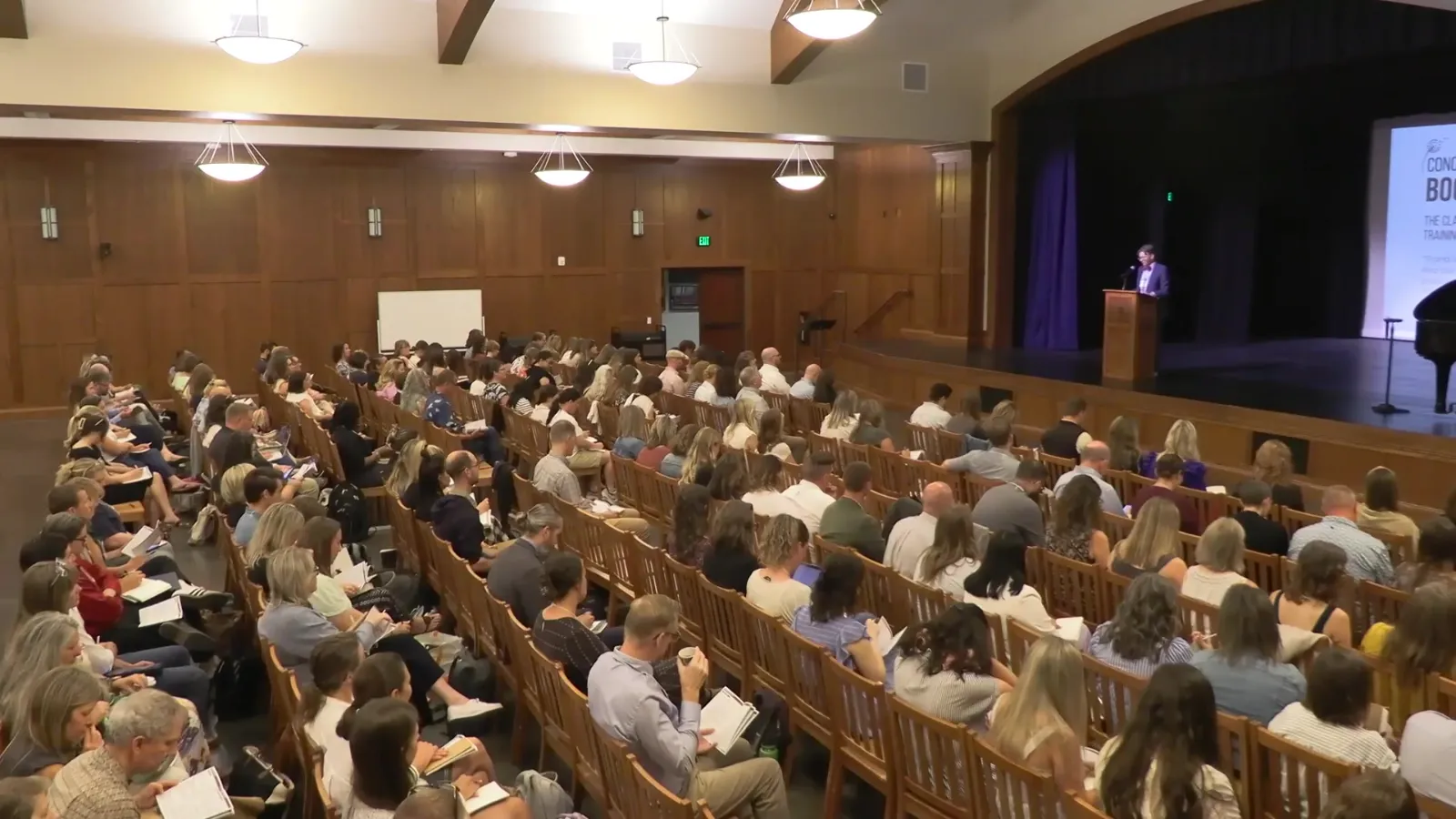 Teachers and school leaders fill an auditorium at Boot Camp 2026